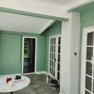 Conservatory redecoration after storm-damaged roof repair